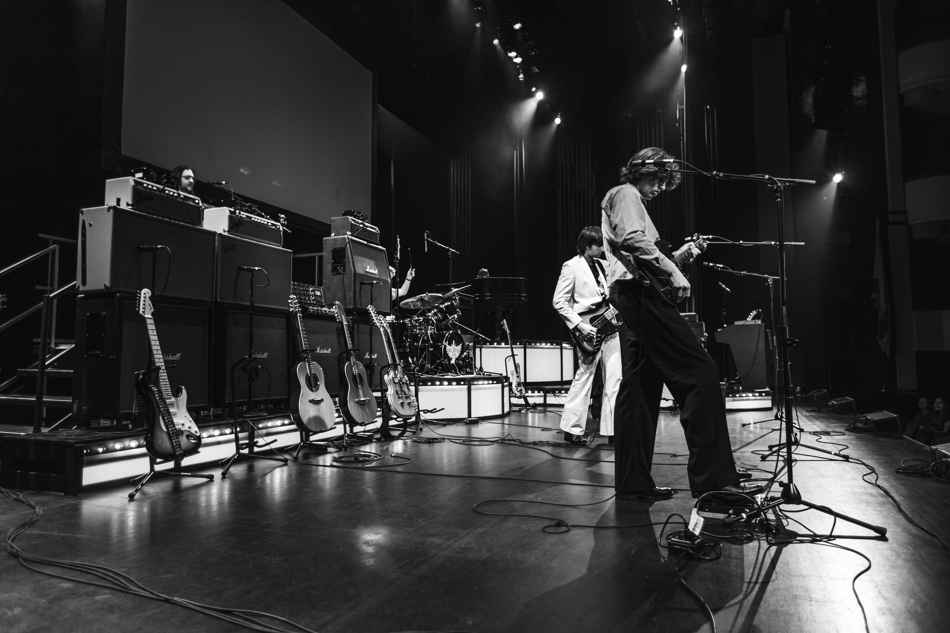 Black and white live performance photograph of The McCartney Years